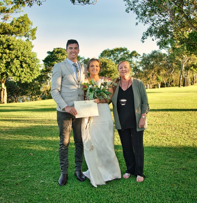 civil celebrant jenny stevens with a married couple in Townsville