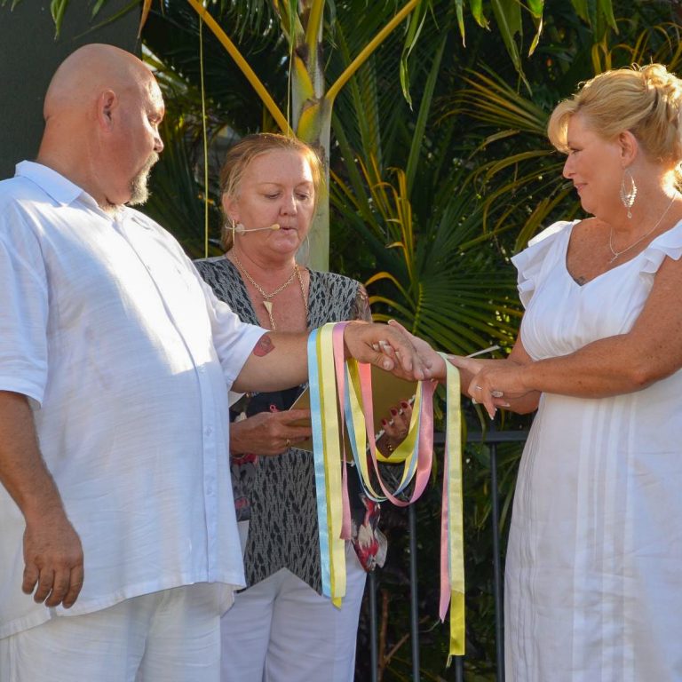 Binding of the hands ceremony at an elopement style ceremony with Jenny Stevens celebrant Charters Towers